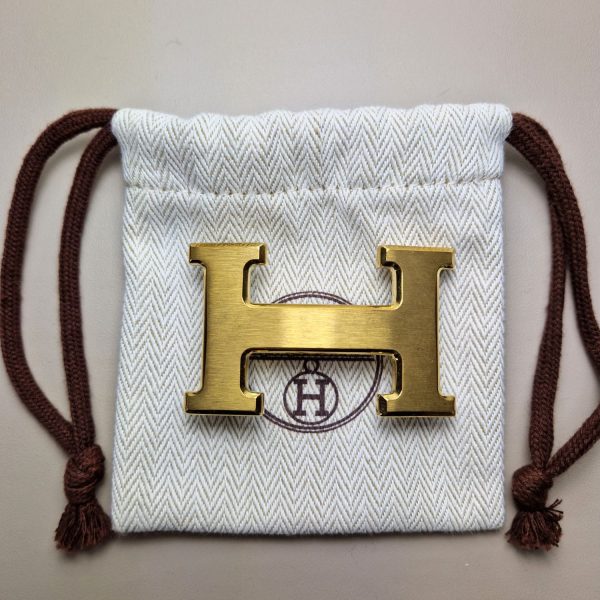 Boucle de ceinture Hermès H en métal doré brossé