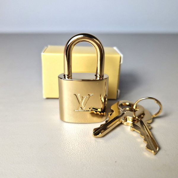 Cadenas Louis Vuitton doré pour sac Speedy